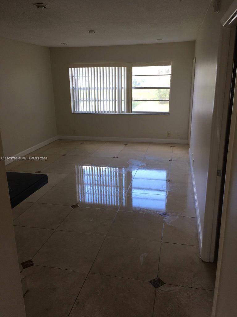 Lauderdale Lakes, FL 33313,5021 W Oakland Park Blvd #106