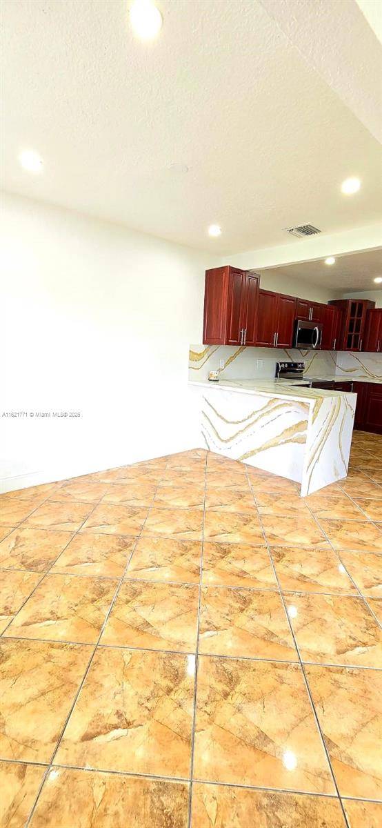 Hialeah, FL 33012,385 W 63rd St