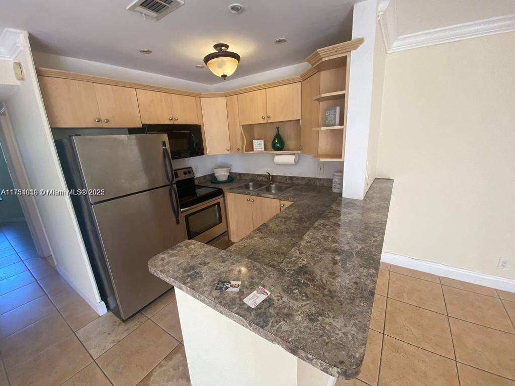 Coral Springs, FL 33065,3031 NW 118th Dr #221D