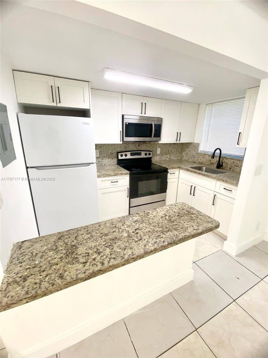 North Lauderdale, FL 33068,850 SW 74 TER #1