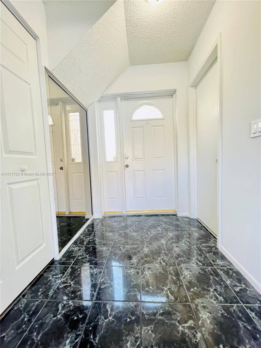 Lauderhill, FL 33313,5809 NW 21st St #20-A