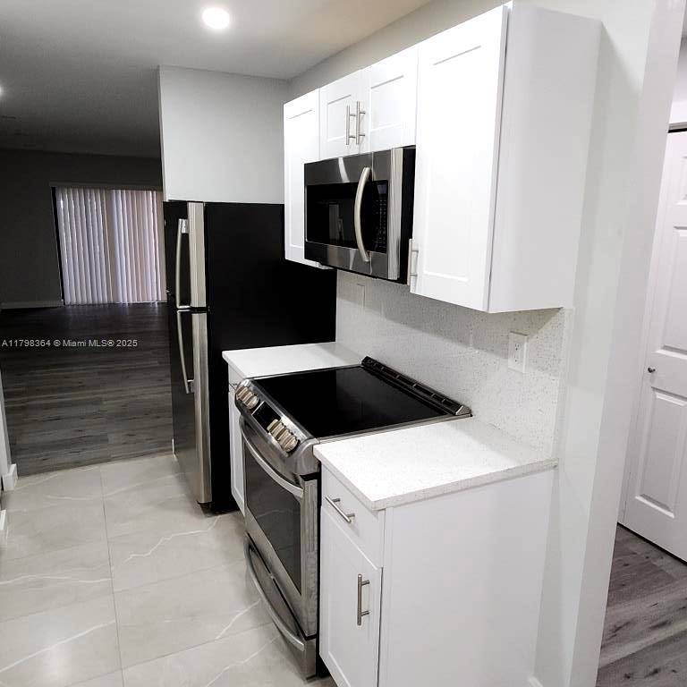 Coral Springs, FL 33071,1335 NW 94th Way #1335