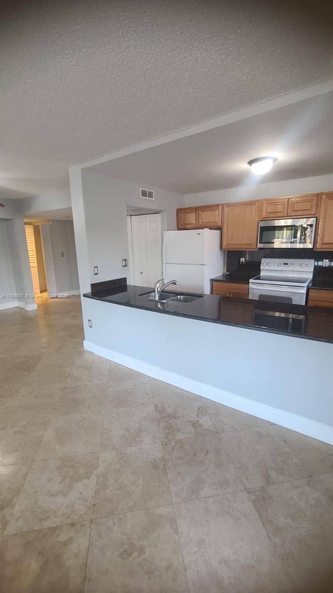 Miami, FL 33169,16220 NW 2nd Ave #213