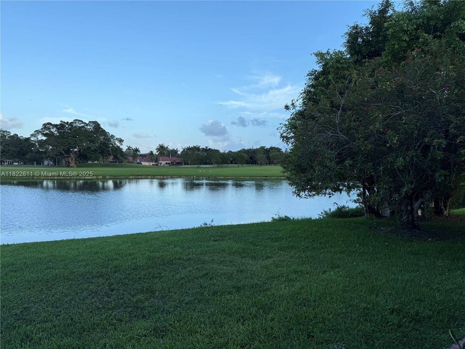 Weston, FL 33326,566 VILLAGE LAKE DRIVE