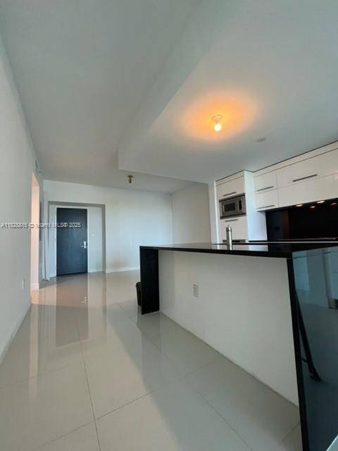 Miami, FL 33132,900 Biscayne Blvd #405