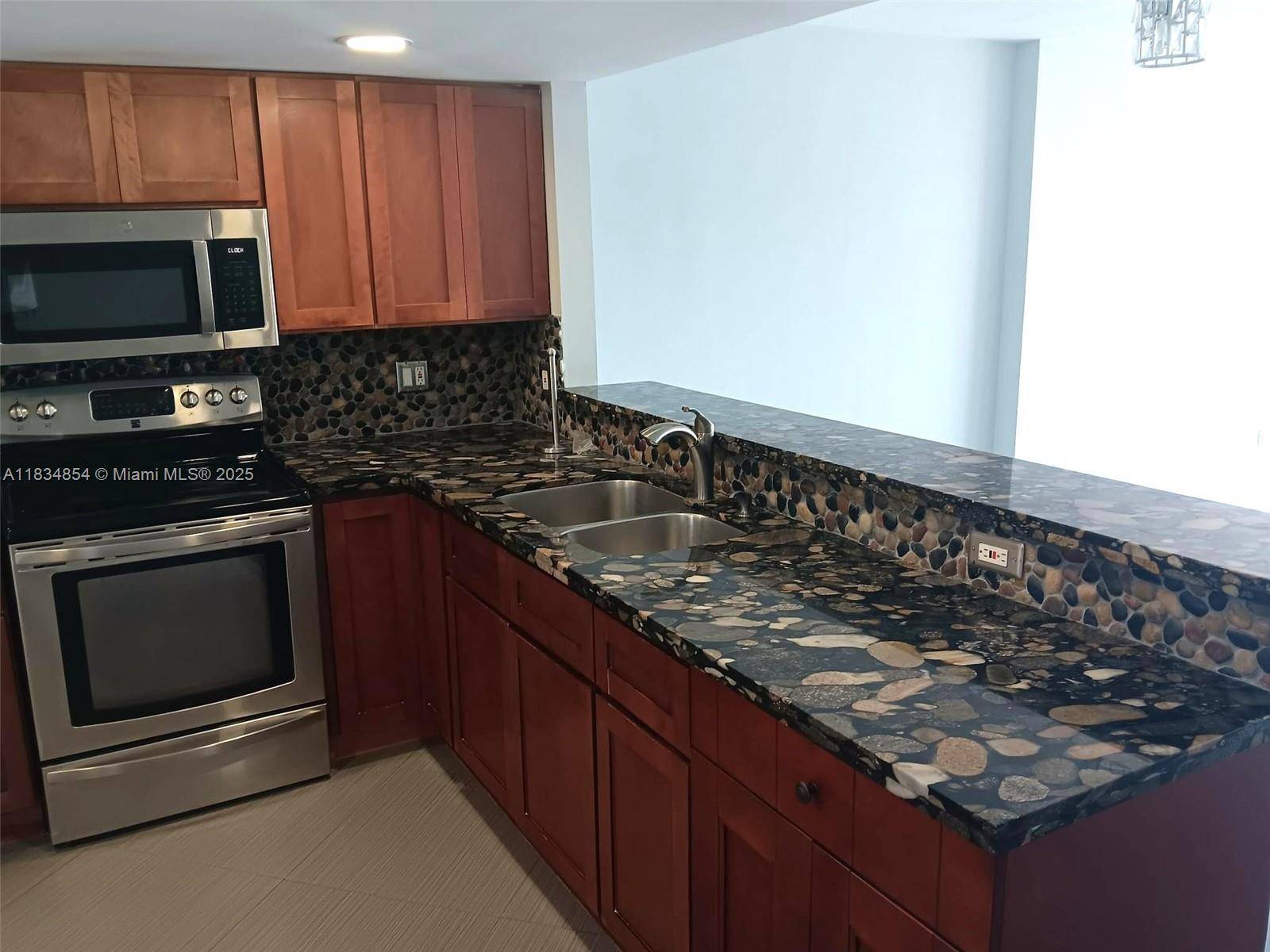 North Miami Beach, FL 33160,3703 NE 166th St #204