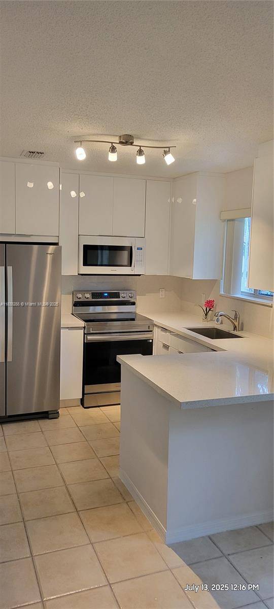 Pembroke Pines, FL 33024,2125 NW 77th Way #201