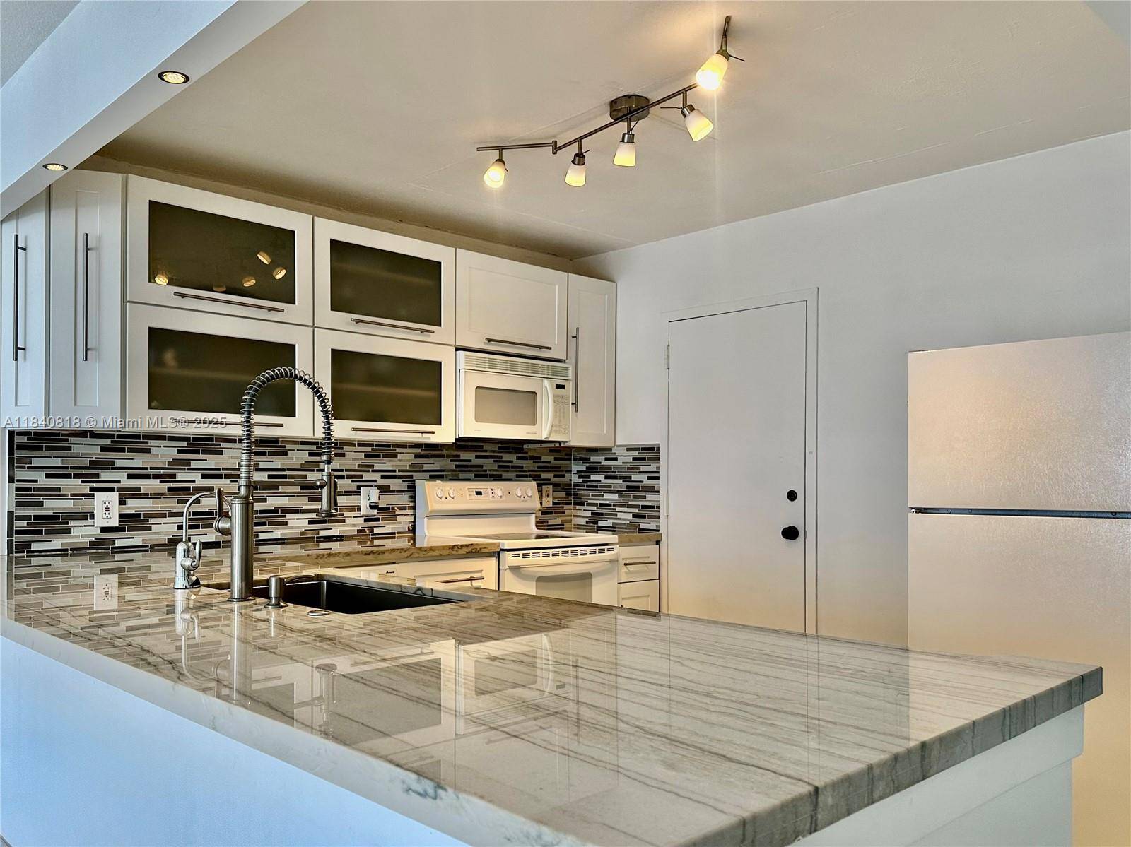 Hallandale Beach, FL 33009,427 Golden Isles Dr #14F