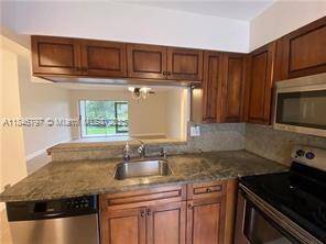 Pompano Beach, FL 33069,713 Gardens Dr #102