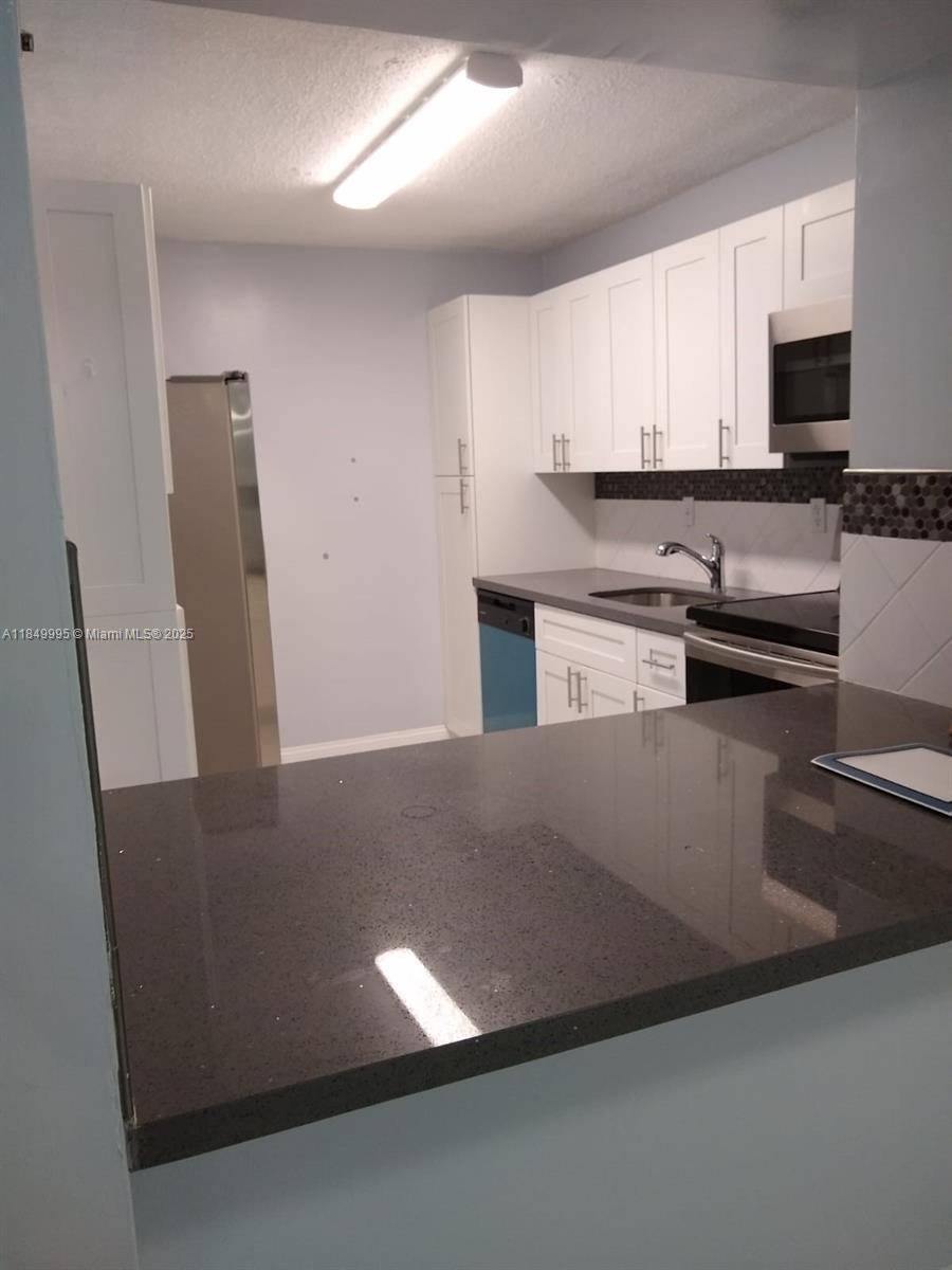 Miami, FL 33179,20680 NE 4th Ct #104
