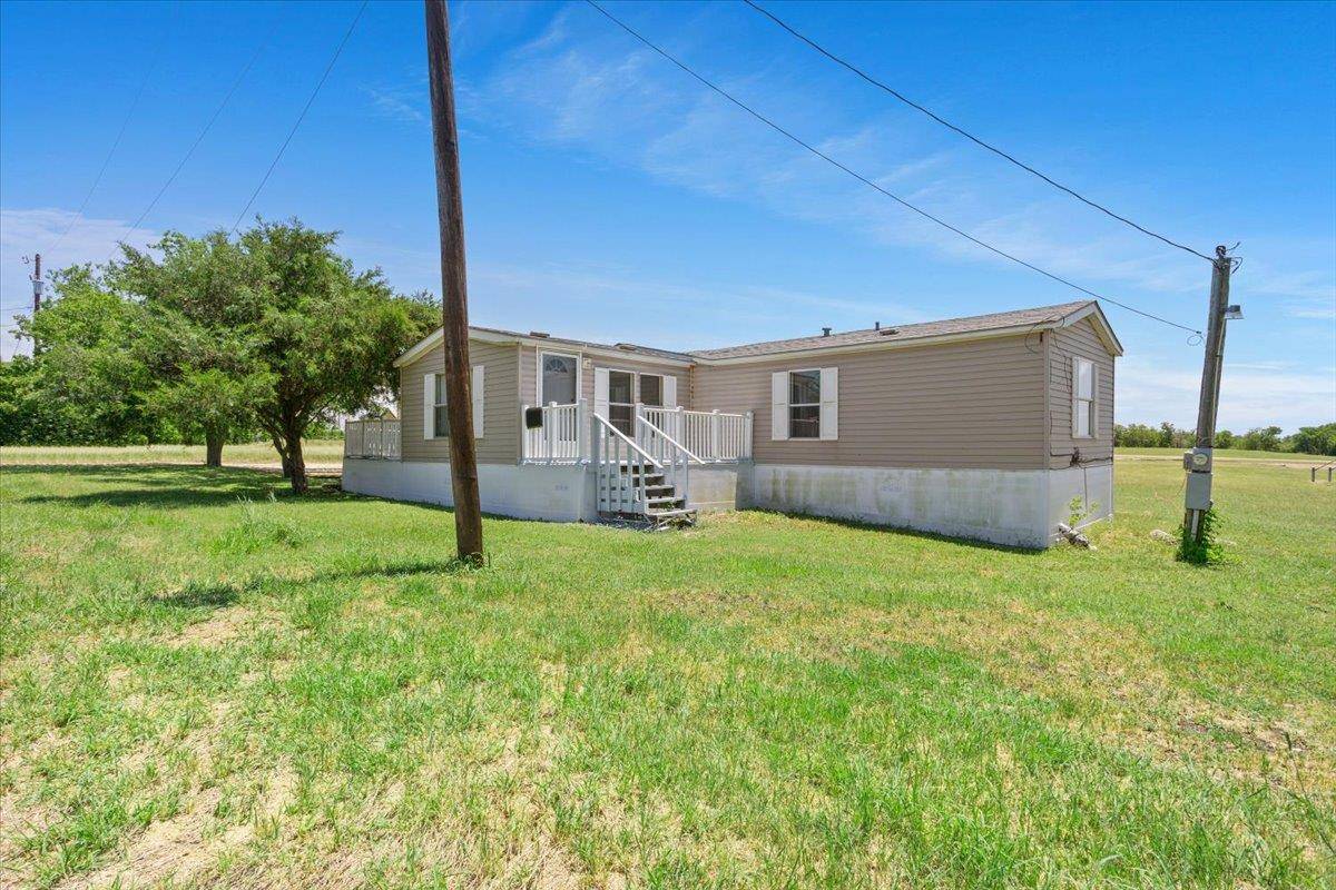 Rogers, TX 76569,216 Moore ST