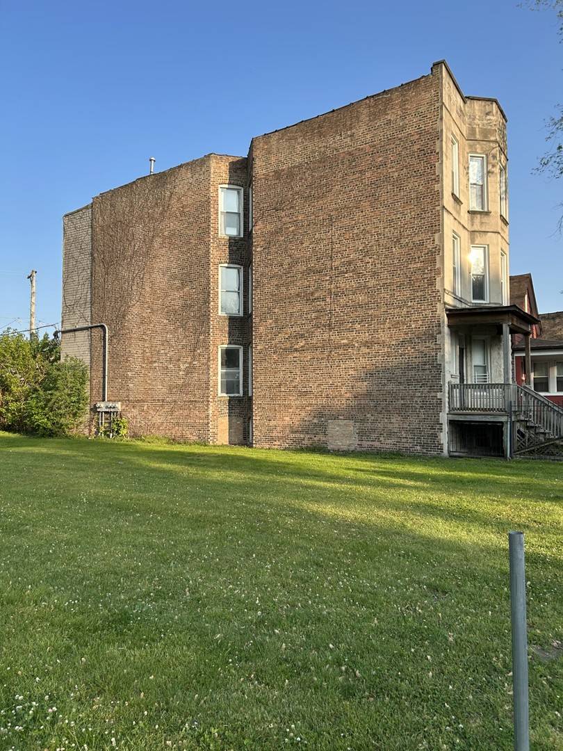Chicago, IL 60637,6409 S Rhodes AVE