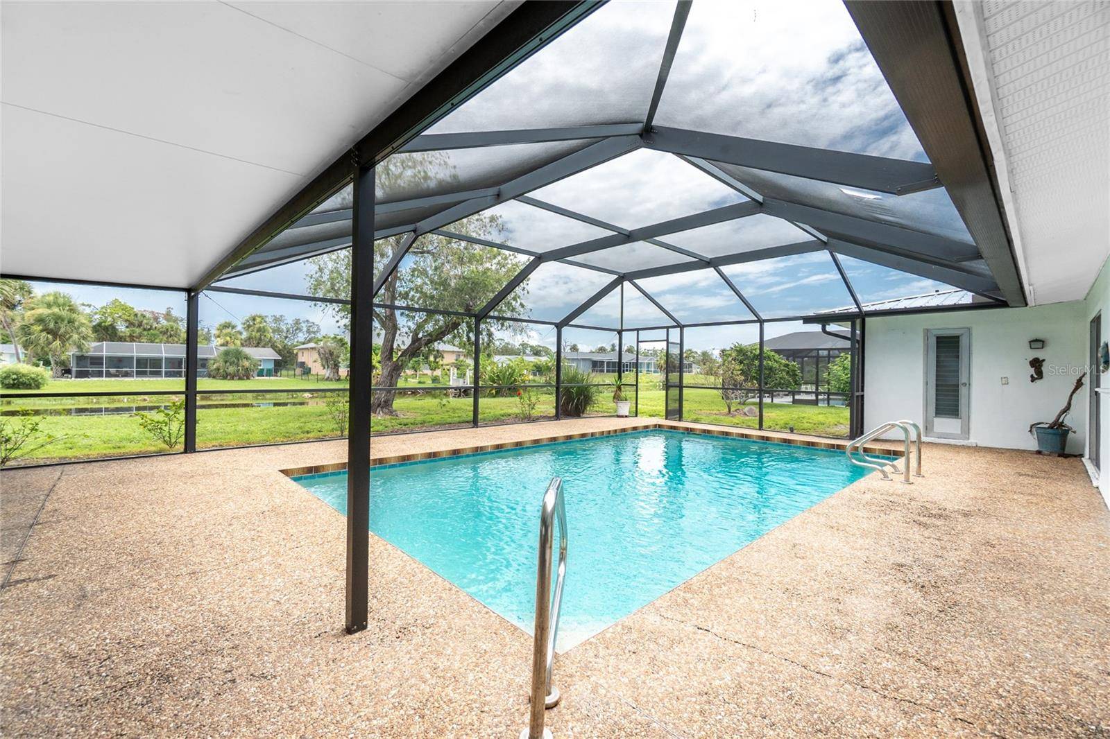 Rotonda West, FL 33947,261 CADDY RD