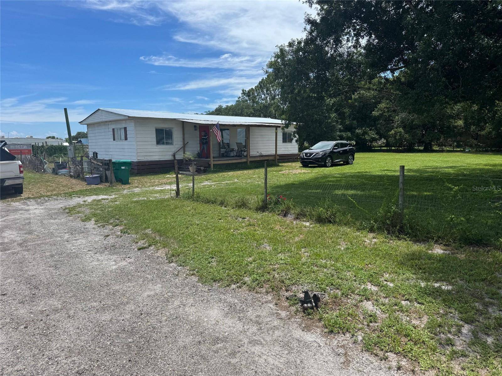 Okeechobee, FL 34972,702 NW 160TH ST