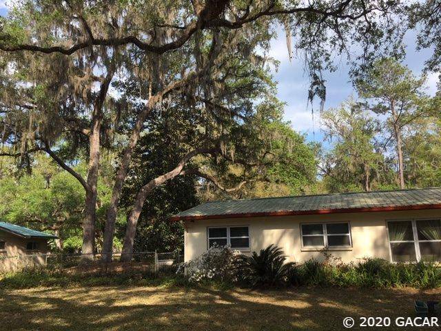 Micanopy, FL 32667,103 NE Evans CT