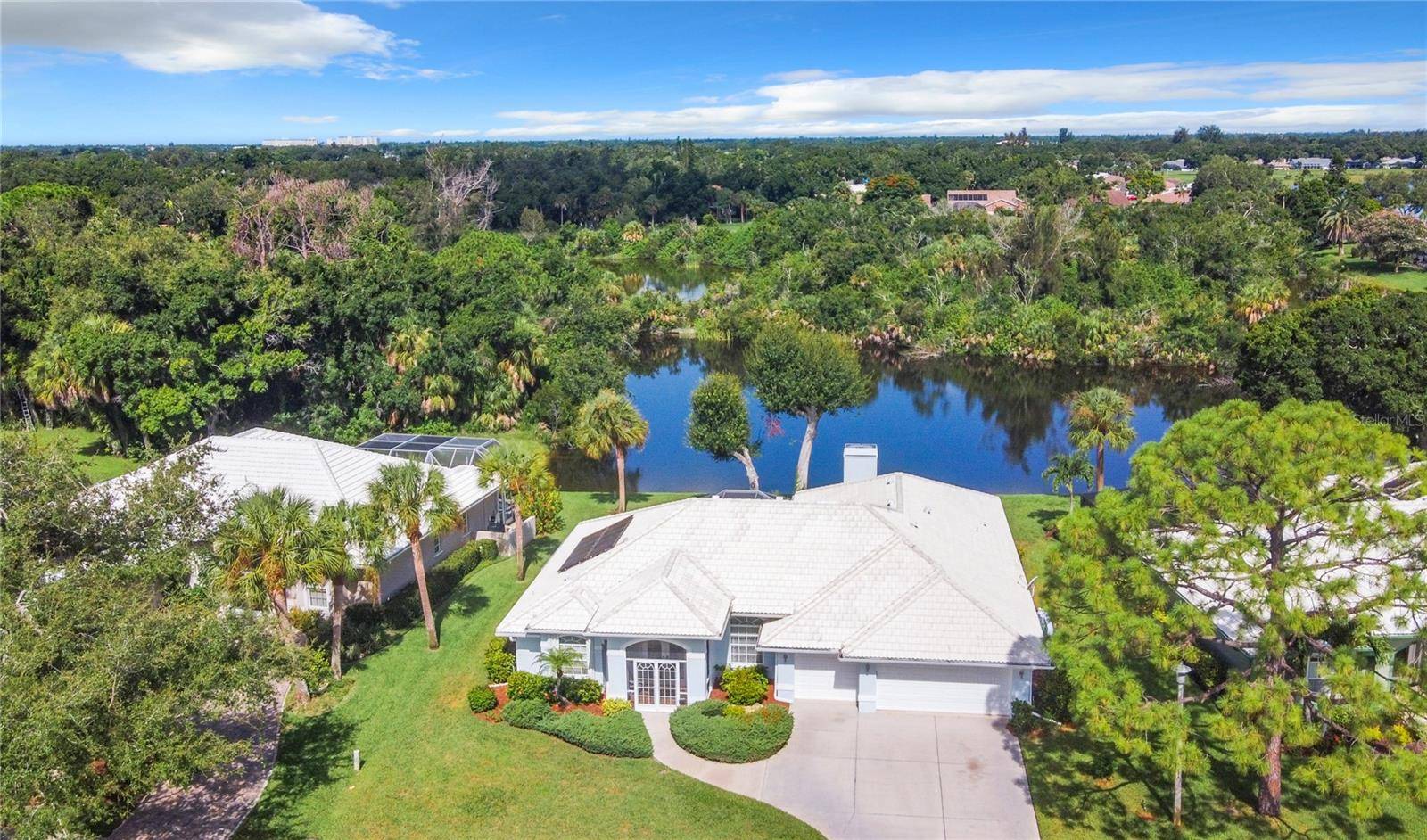 Venice, FL 34293,490 LAKE OF THE WOODS DR