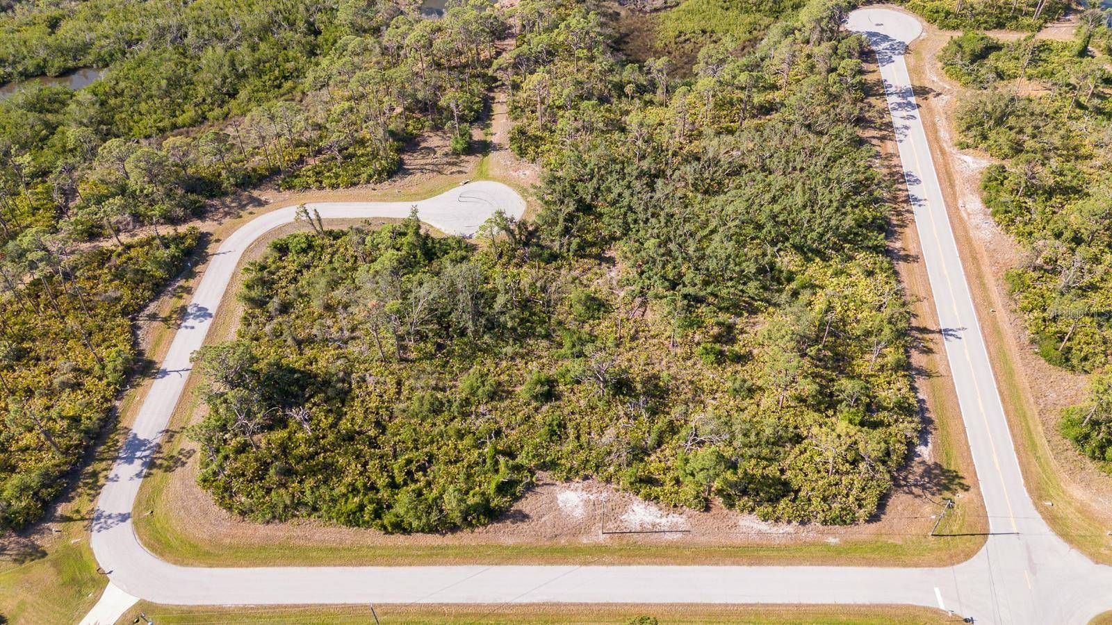 Rotonda West, FL 33947,123 FLOWER RD
