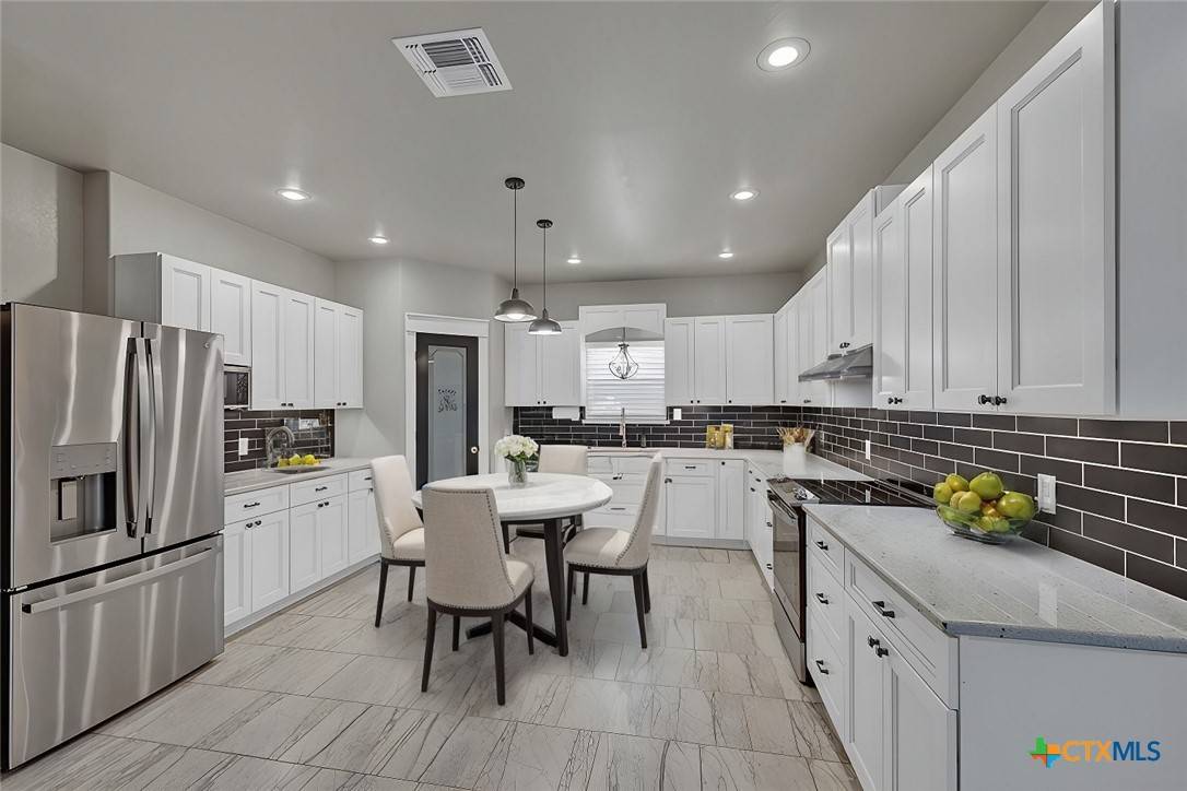 Adkins, TX 78101,682 Stuart Rd