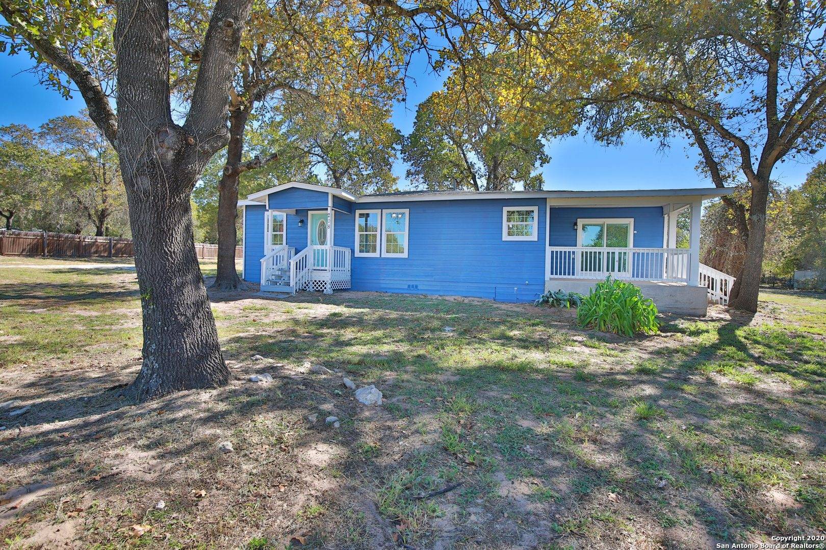 Floresville, TX 78114-9371,208 CREEKSIDE DR