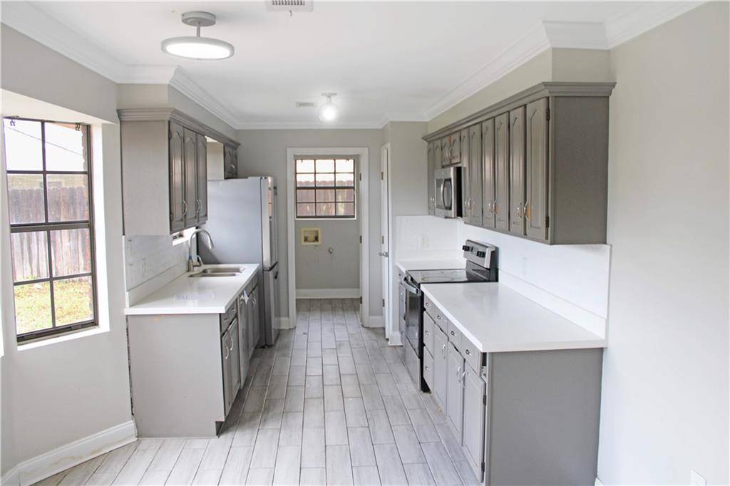 Violet, LA 70092,3108 OAK DR