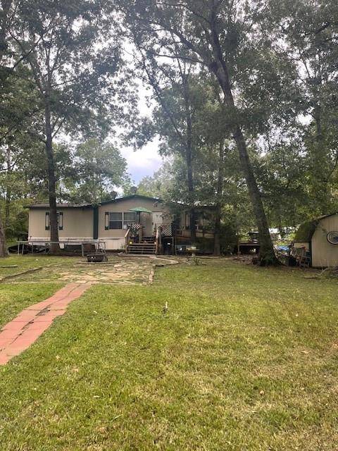 Point Blank, TX 77364,320 Oak Tree DR