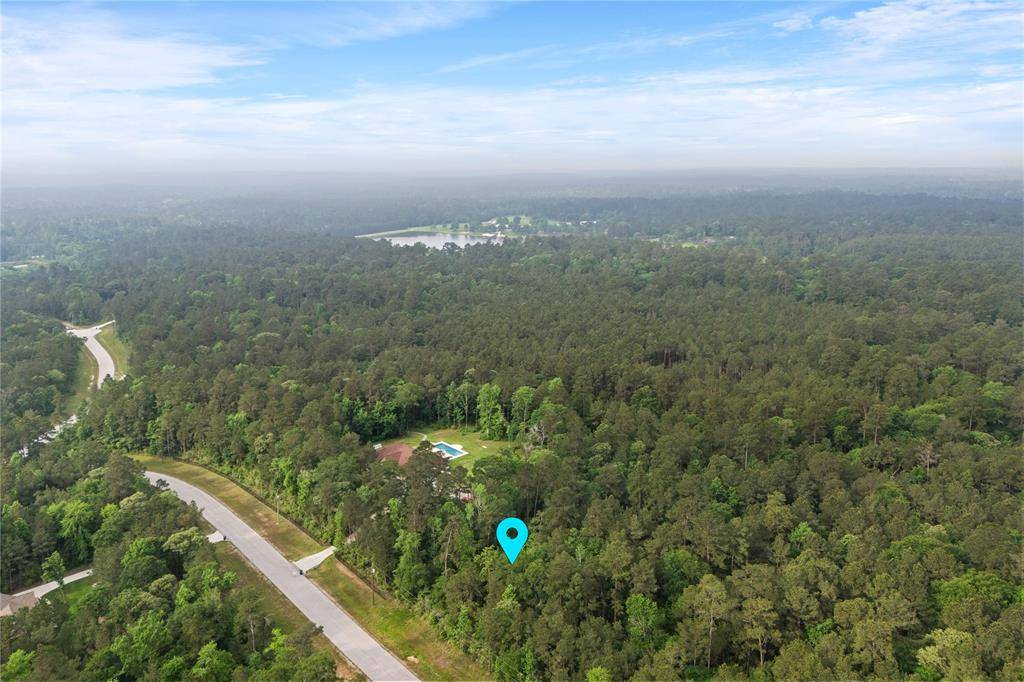 Huntsville, TX 77340,32-22-11 Grey Feather RD