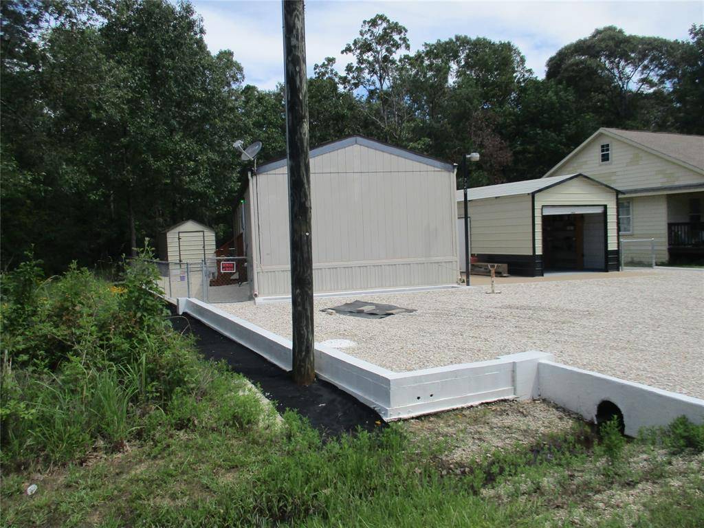 Point Blank, TX 77364,720 Hidden Oaks DR