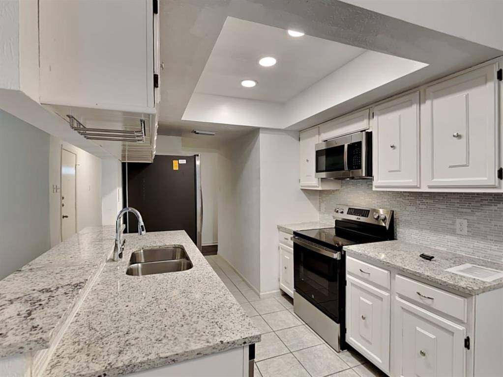 Spring, TX 77380,14 S White Pebble CT