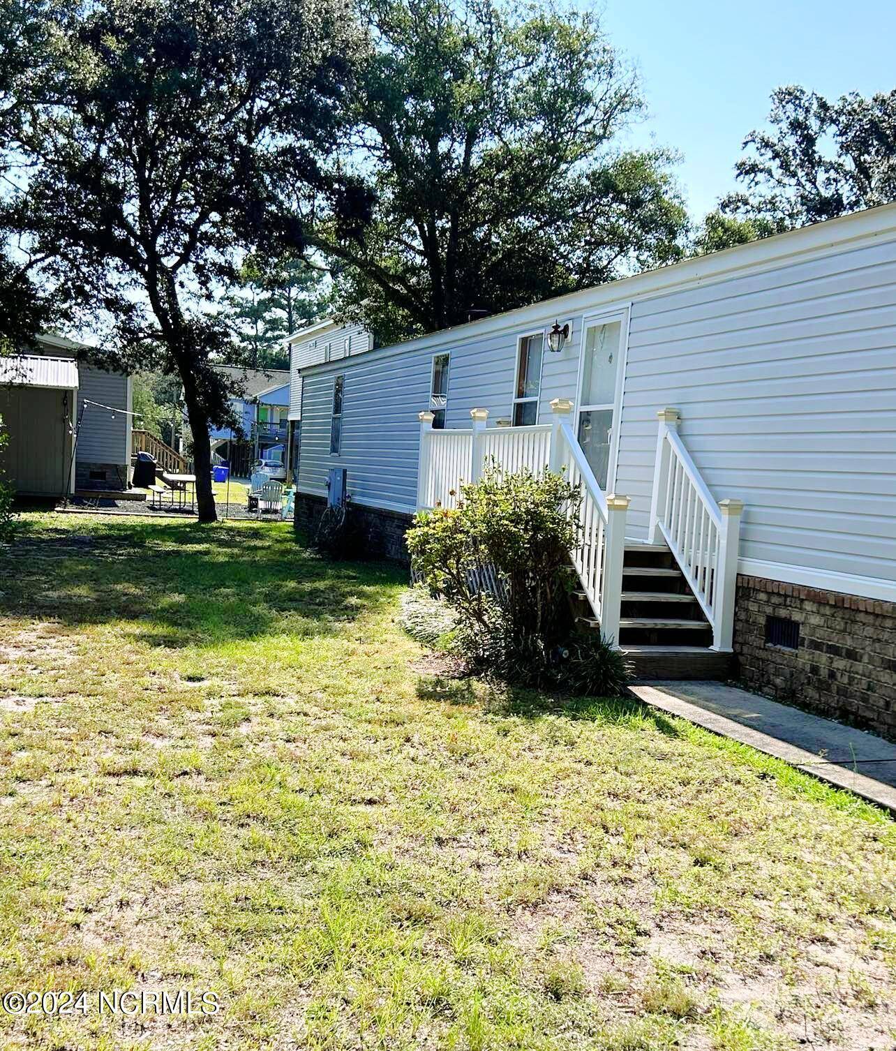 Oak Island, NC 28465,106 NE 76th ST