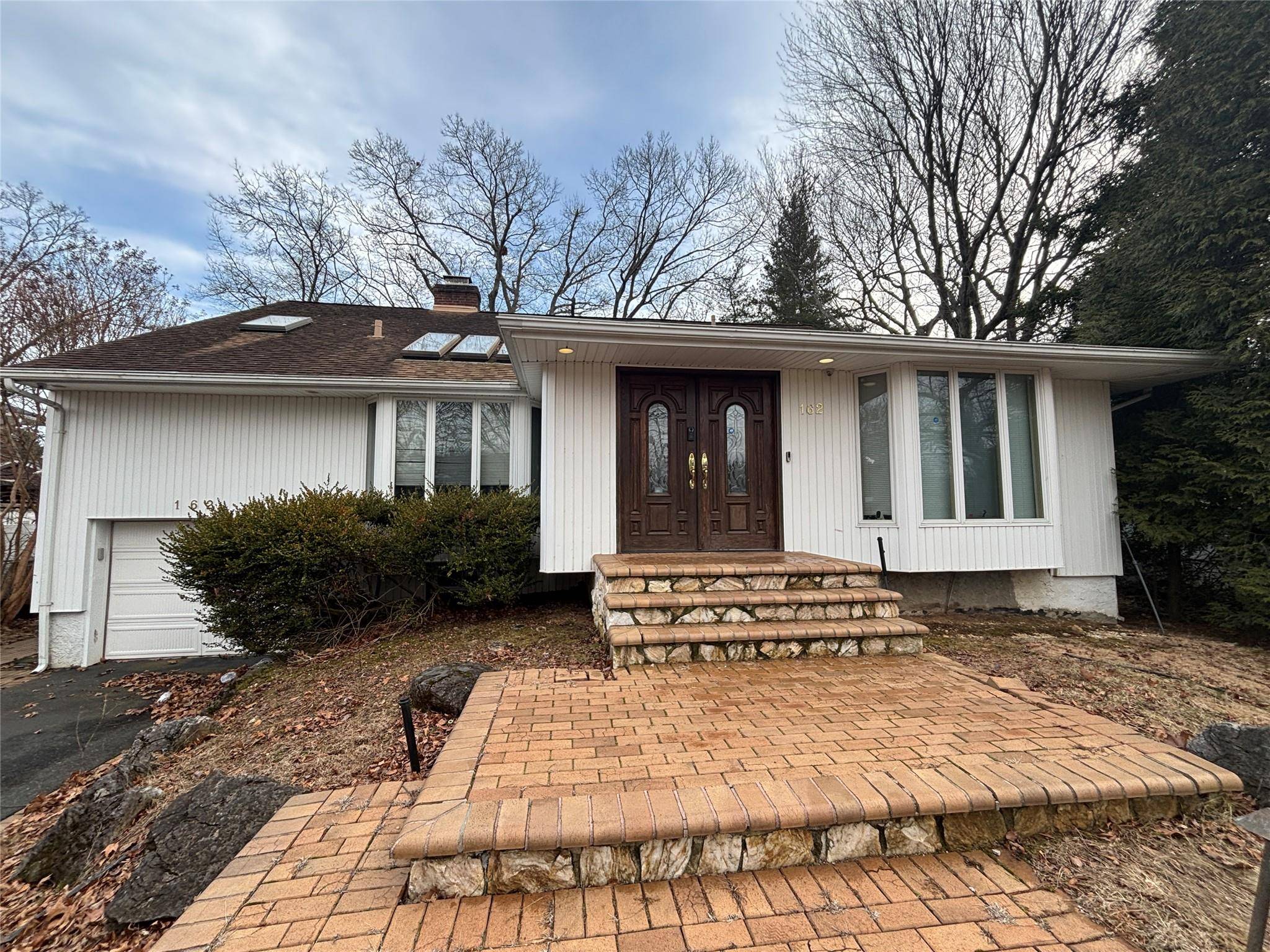 Jericho, NY 11753,162 Birchwood Park DR