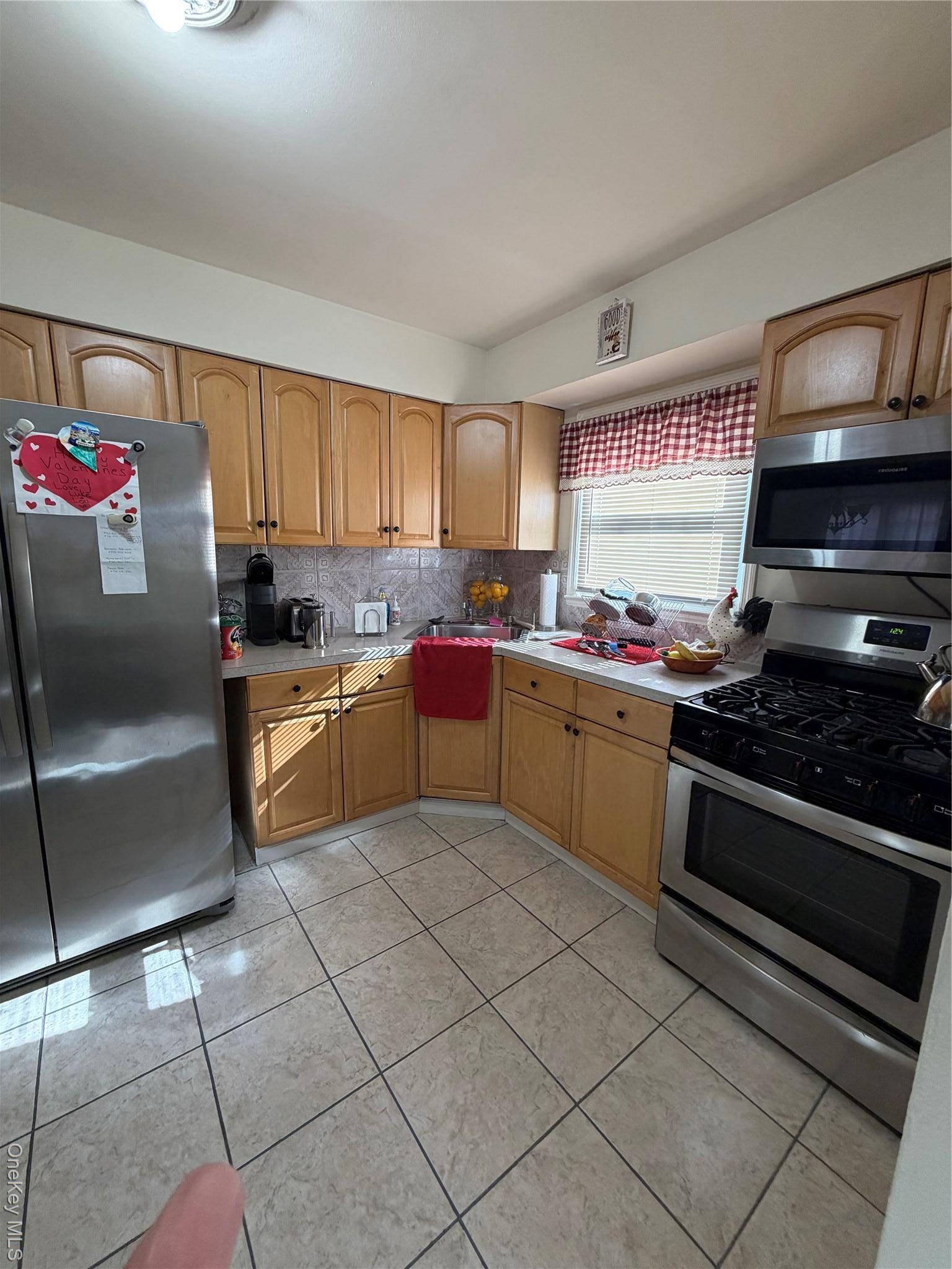 Howard Beach, NY 11414,15721 98th ST