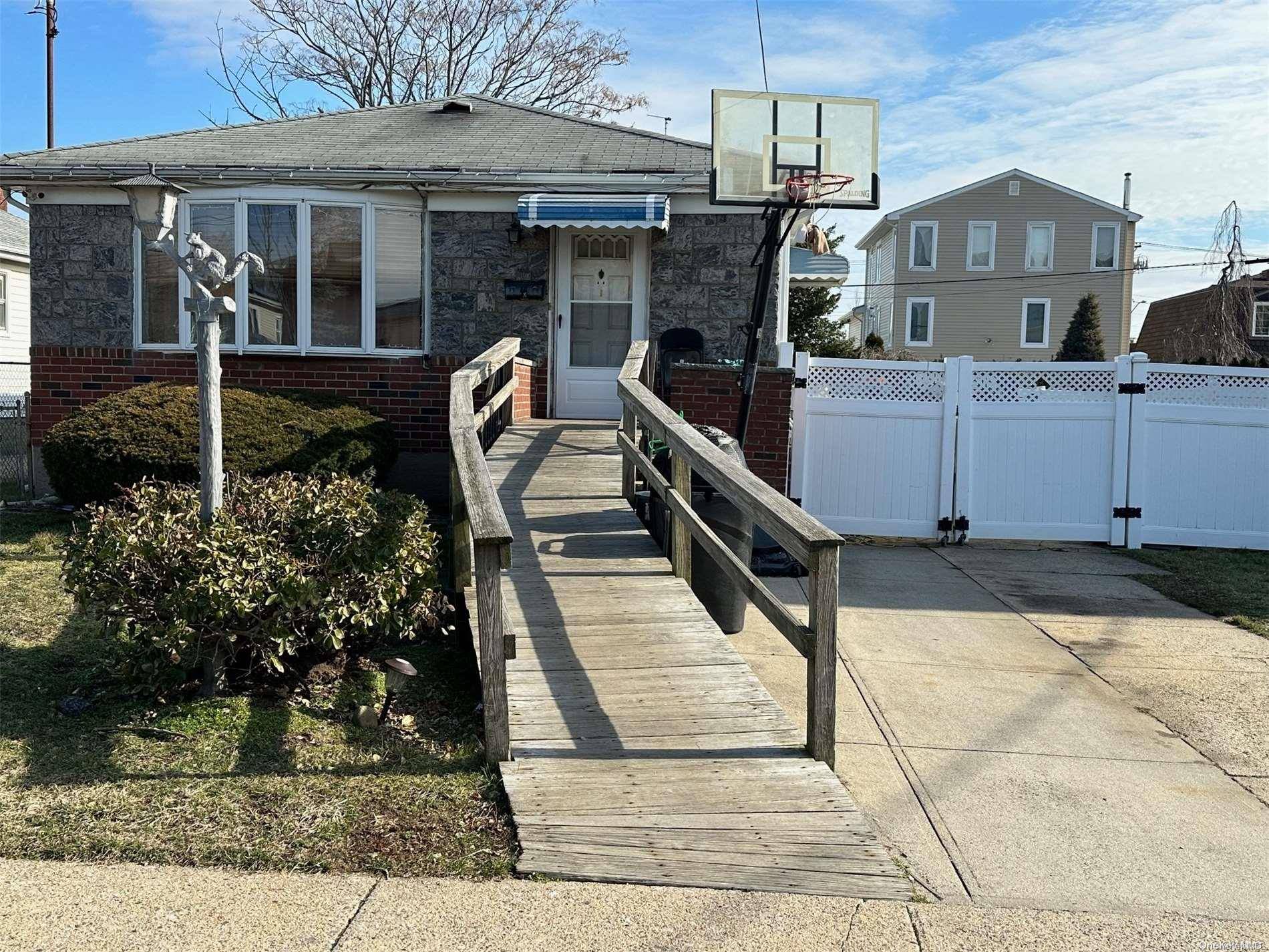 Howard Beach, NY 11414,156-23 88th ST