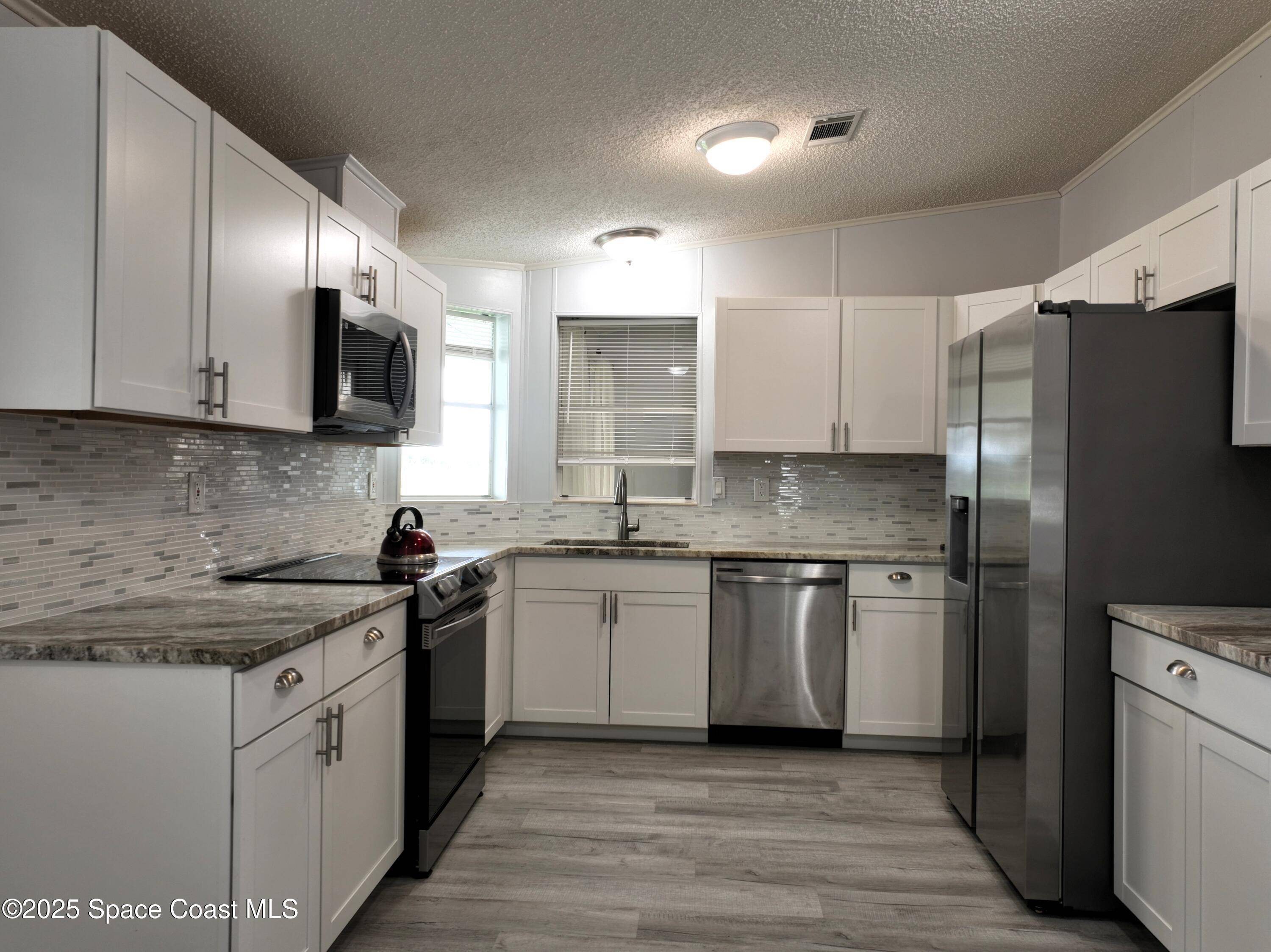 Barefoot Bay, FL 32976,1039 Royal Palm DR