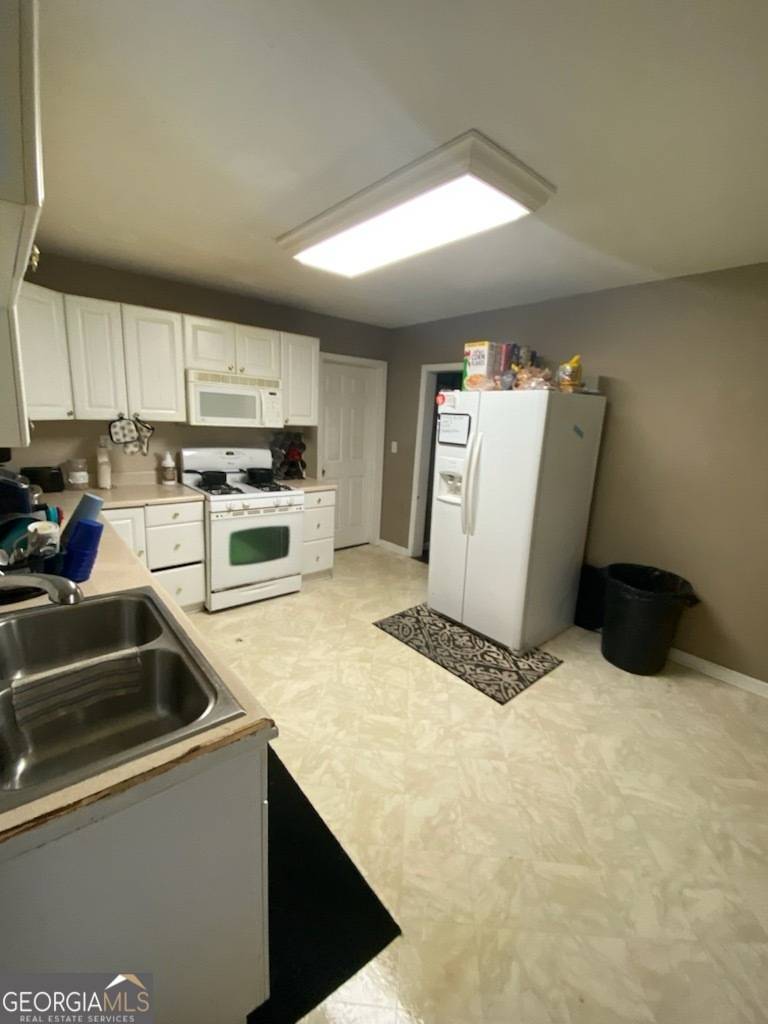 Palmetto, GA 30268,215 Sims ST