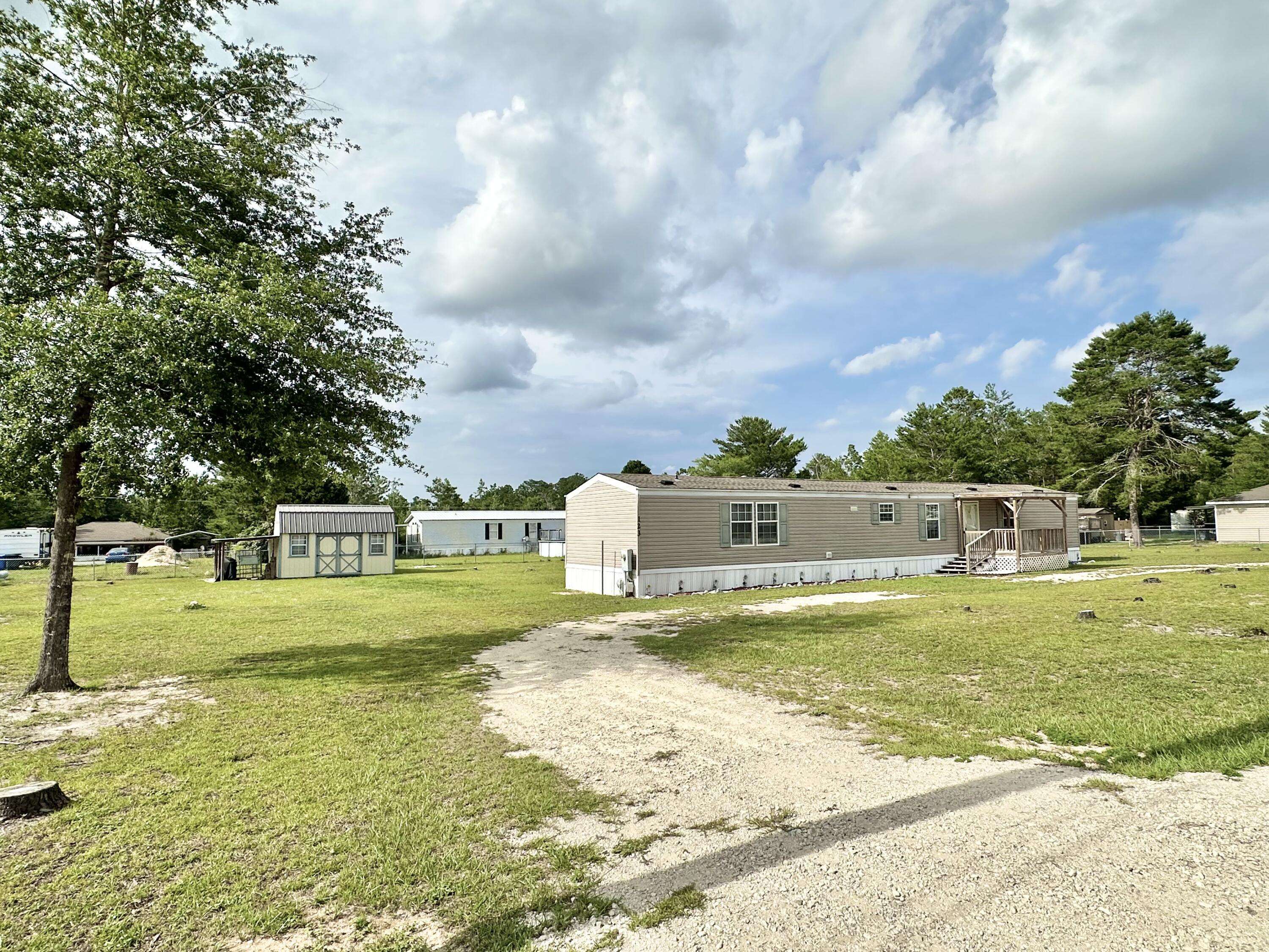 Defuniak Springs, FL 32433,123 Marigold Avenue