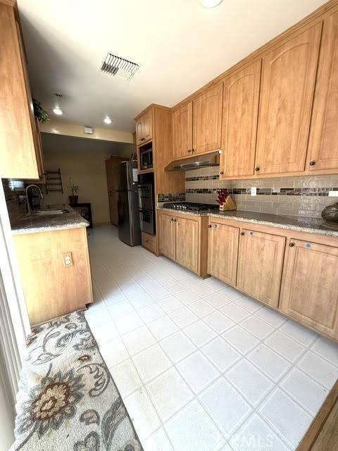 Granada Hills, CA 91343,10022 Gothic AVE