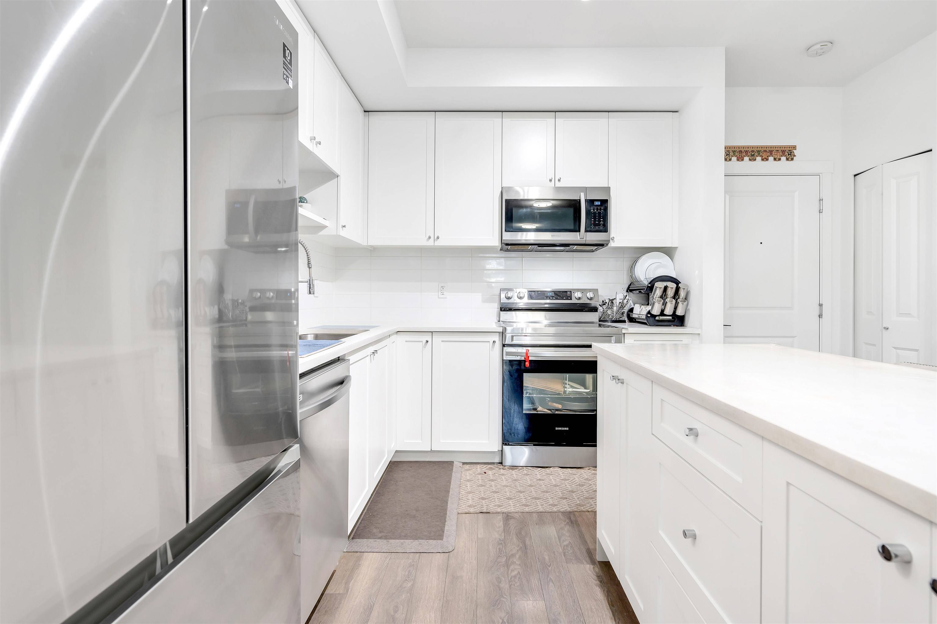 Surrey, BC V3W 3N7,13623 81a AVE #115