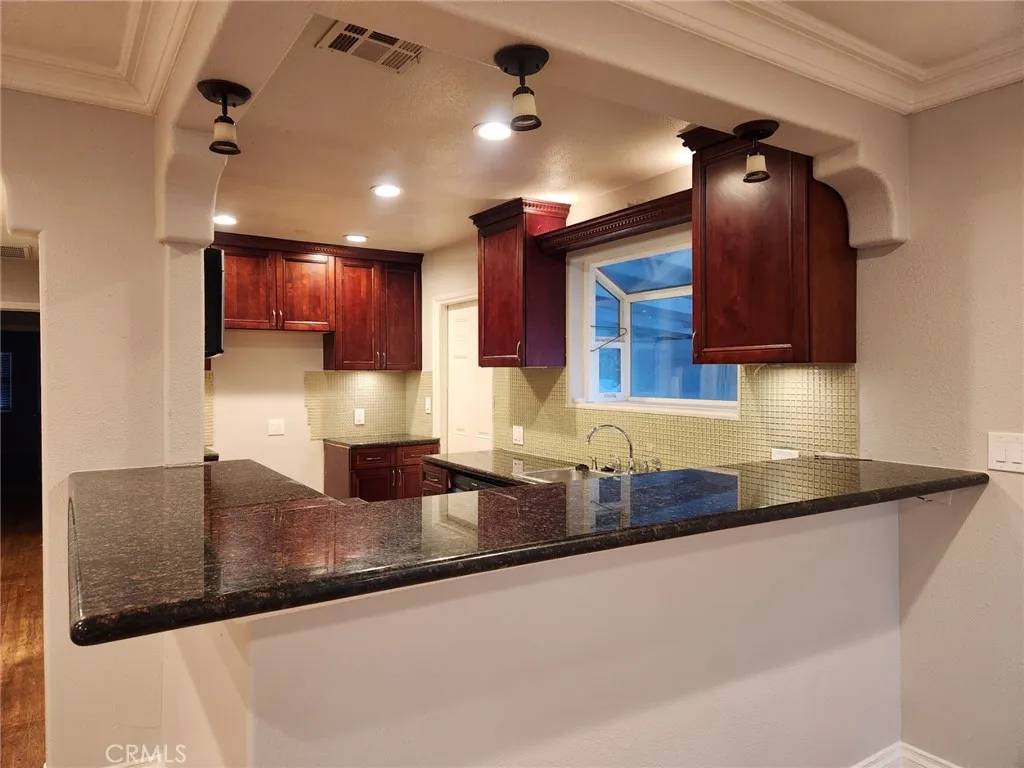 Canoga Park, CA 91303,21057 Runnymede Street