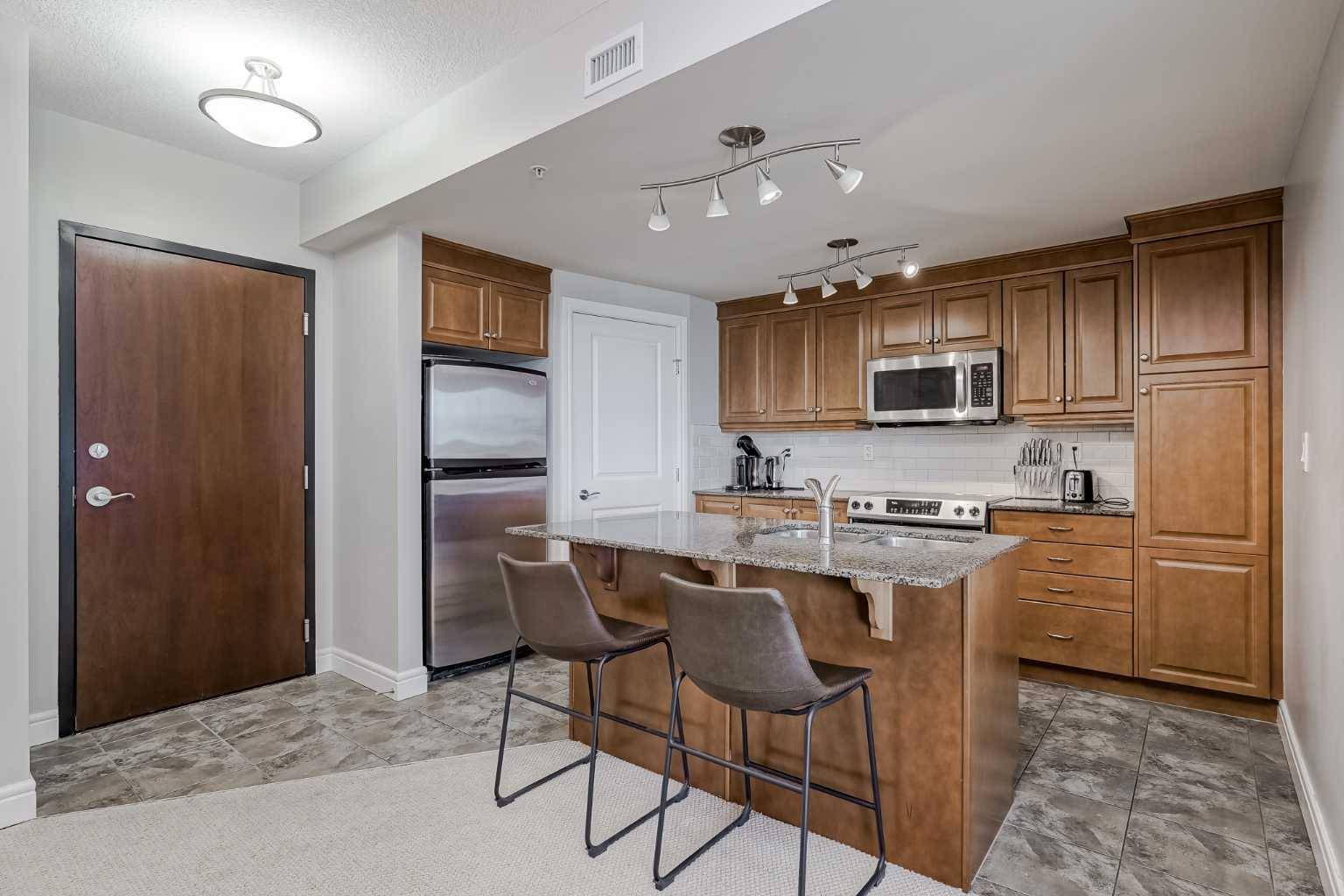 Calgary, AB T2P 0C3,910 5 AVE SW #1402