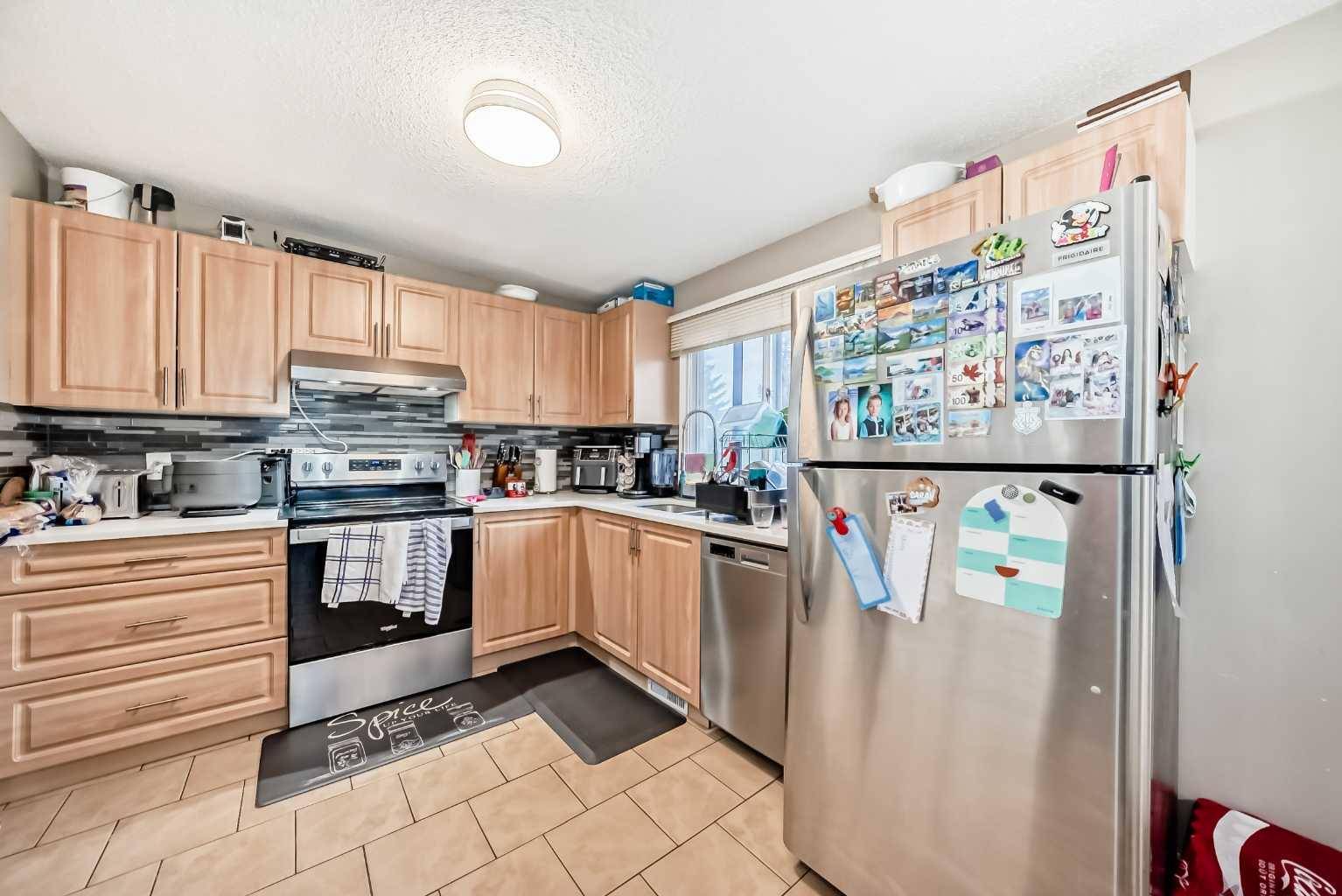 Calgary, AB T2K3Y7,133 & 135 Huntford Close NE