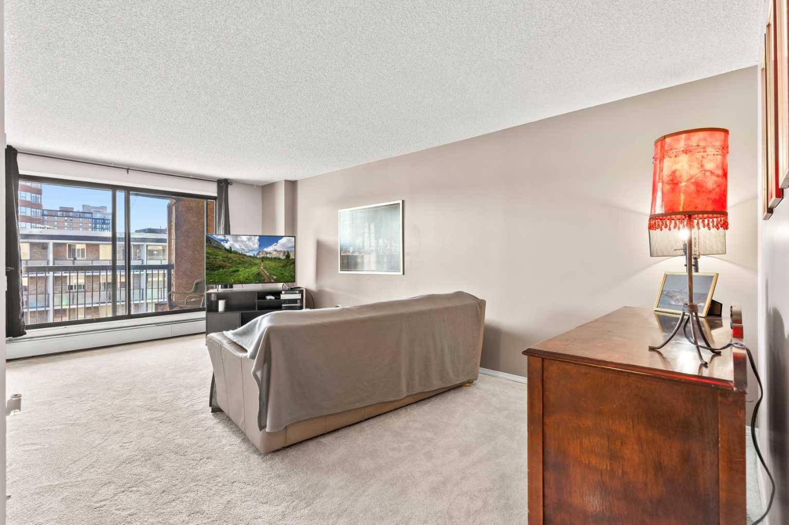 Calgary, AB T2R 0H7,718 12 AVE SW #704