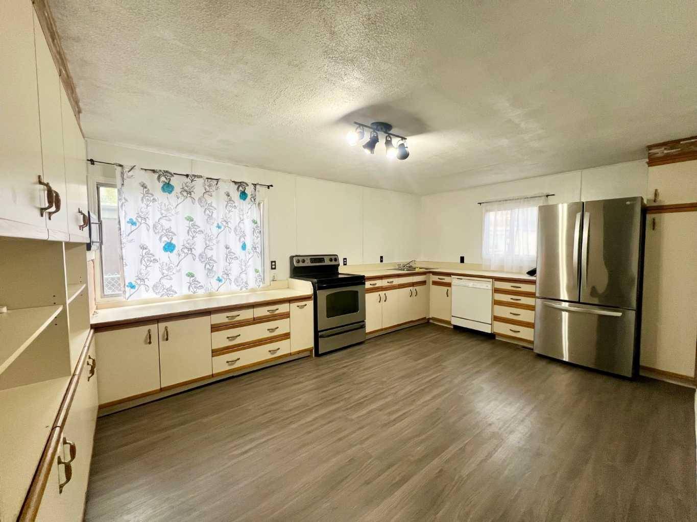 Calgary, AB T3B5N5,3223 83 ST NW #239